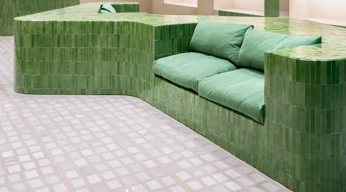 Shoe shop with zellige tiled sitting area and surfaces